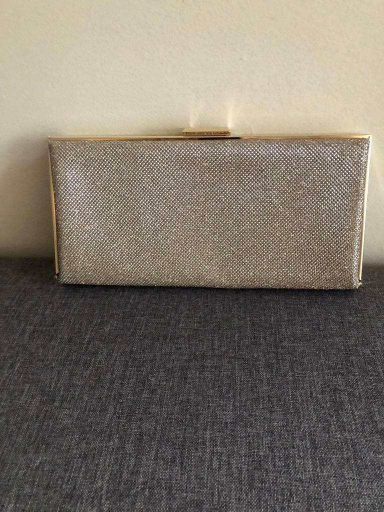 accessorize gold bag